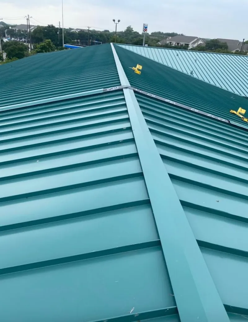 Green commercial metal roof ridge and valley for Metal Roof Repair in Eldridge