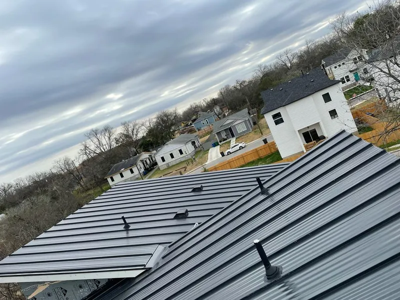 Standing seam metal roof panels with vents for Skylight Repair in Eldridge